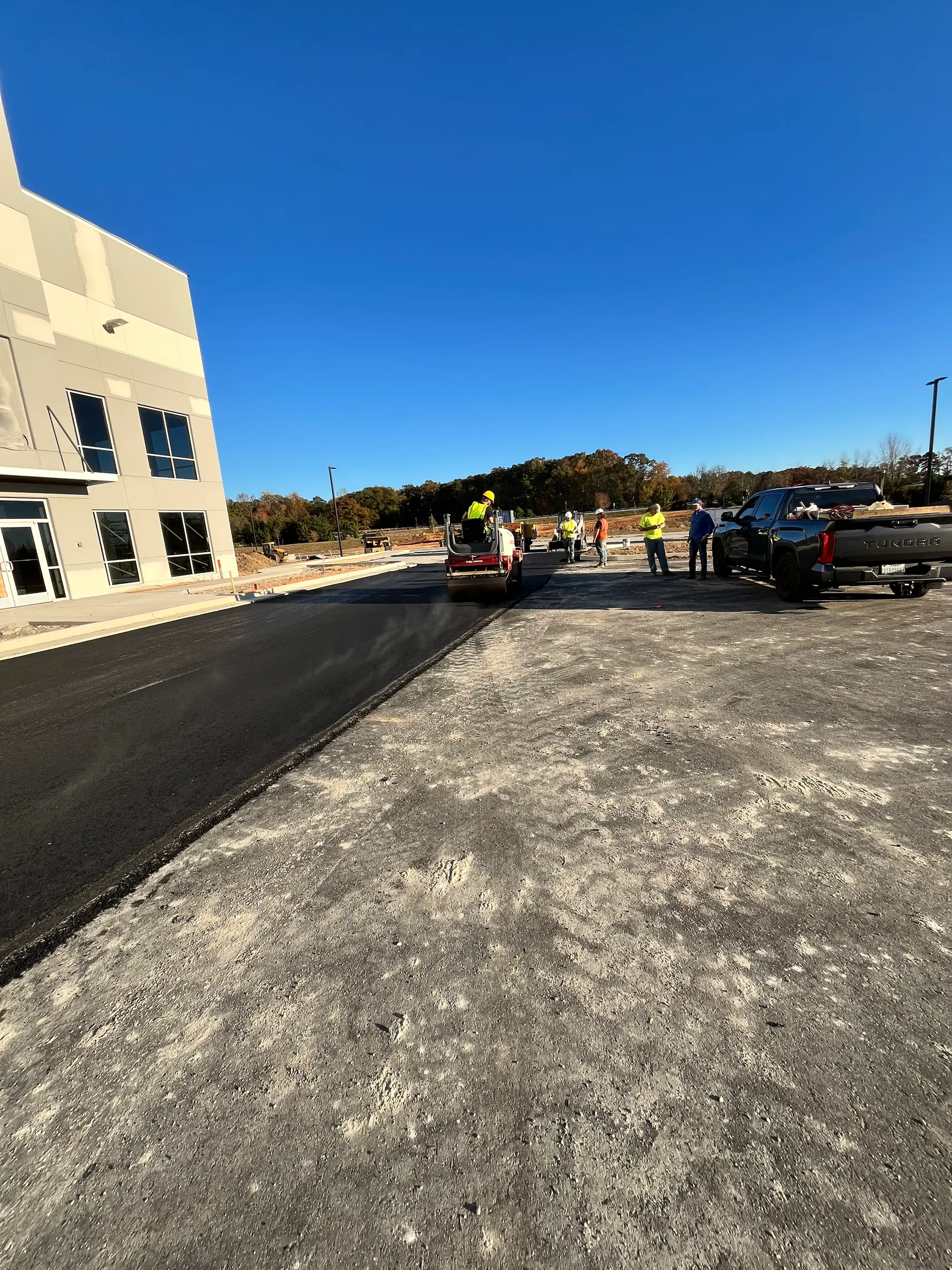 Crew laying first lift at a new commercial building
