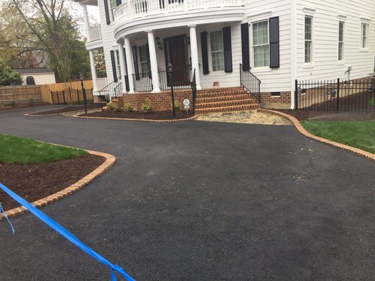 Finished asphalt driveway surface by J. Worden and Sons